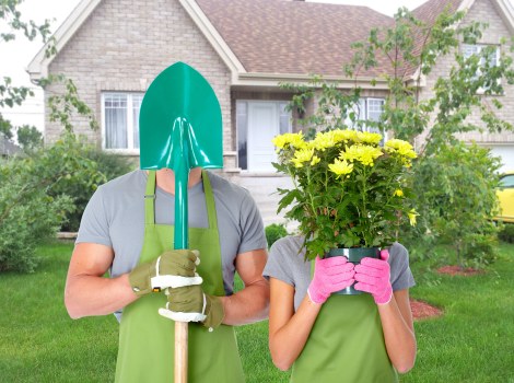 Professional gardeners following health and safety standards